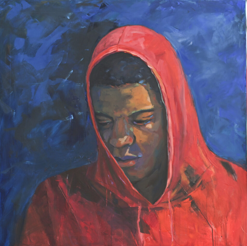 Black teenager in red hoodie