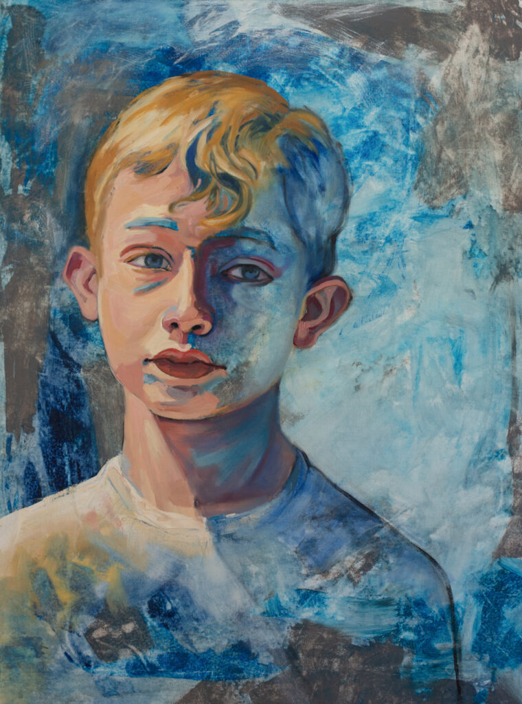 Boy with blonde hair half in shadow